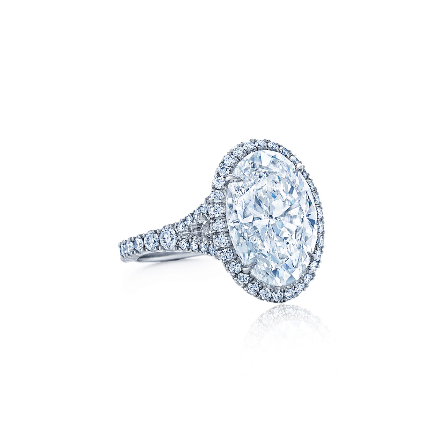 The Kwiat Setting Oval Diamond Engagement Ring with a Diamond Halo and