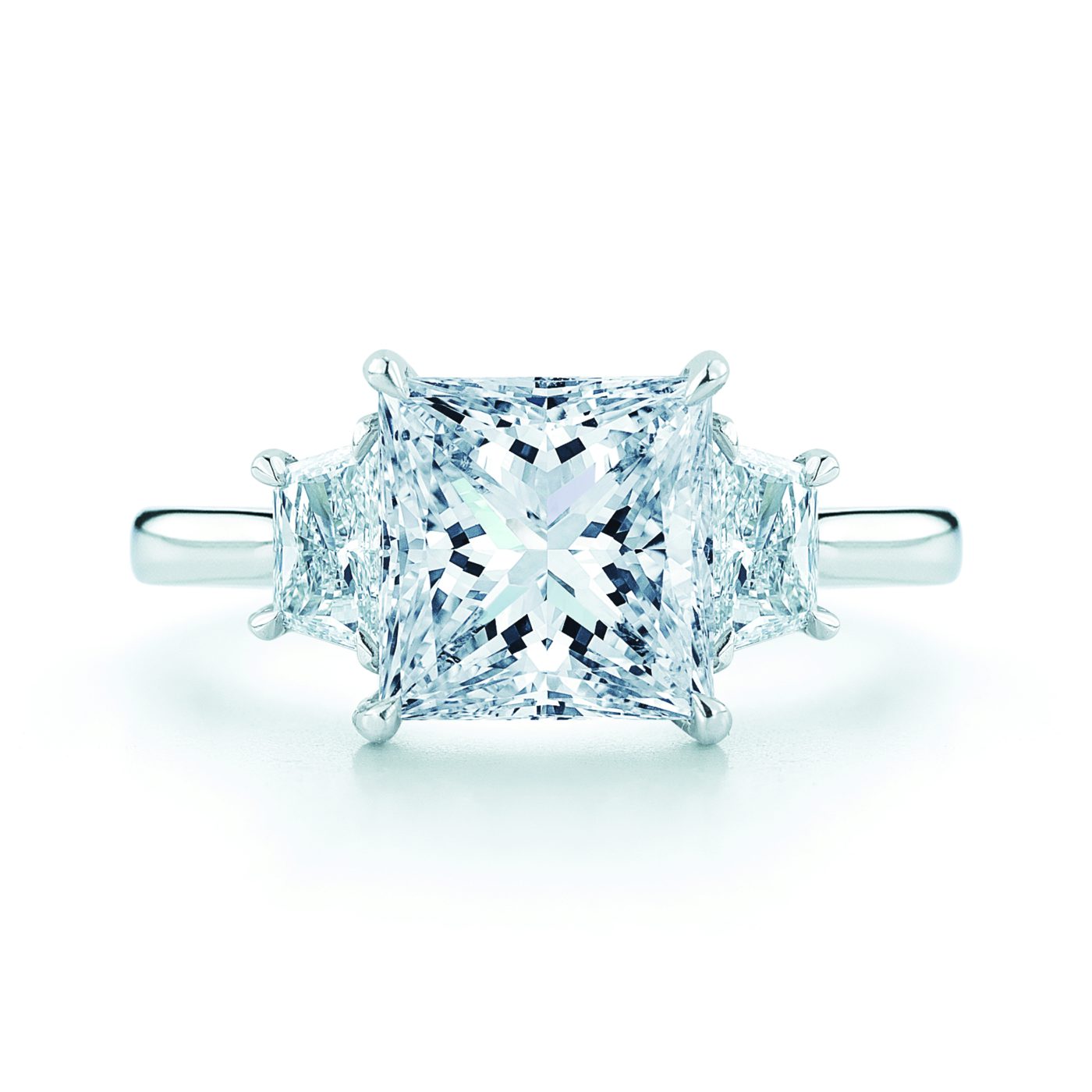 princess cut with pear side stones